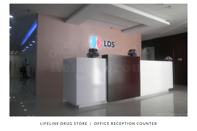 Office Reception Counter made by ANGC Interiors for Lifeline Drug Store in Abu Dhabi UAE